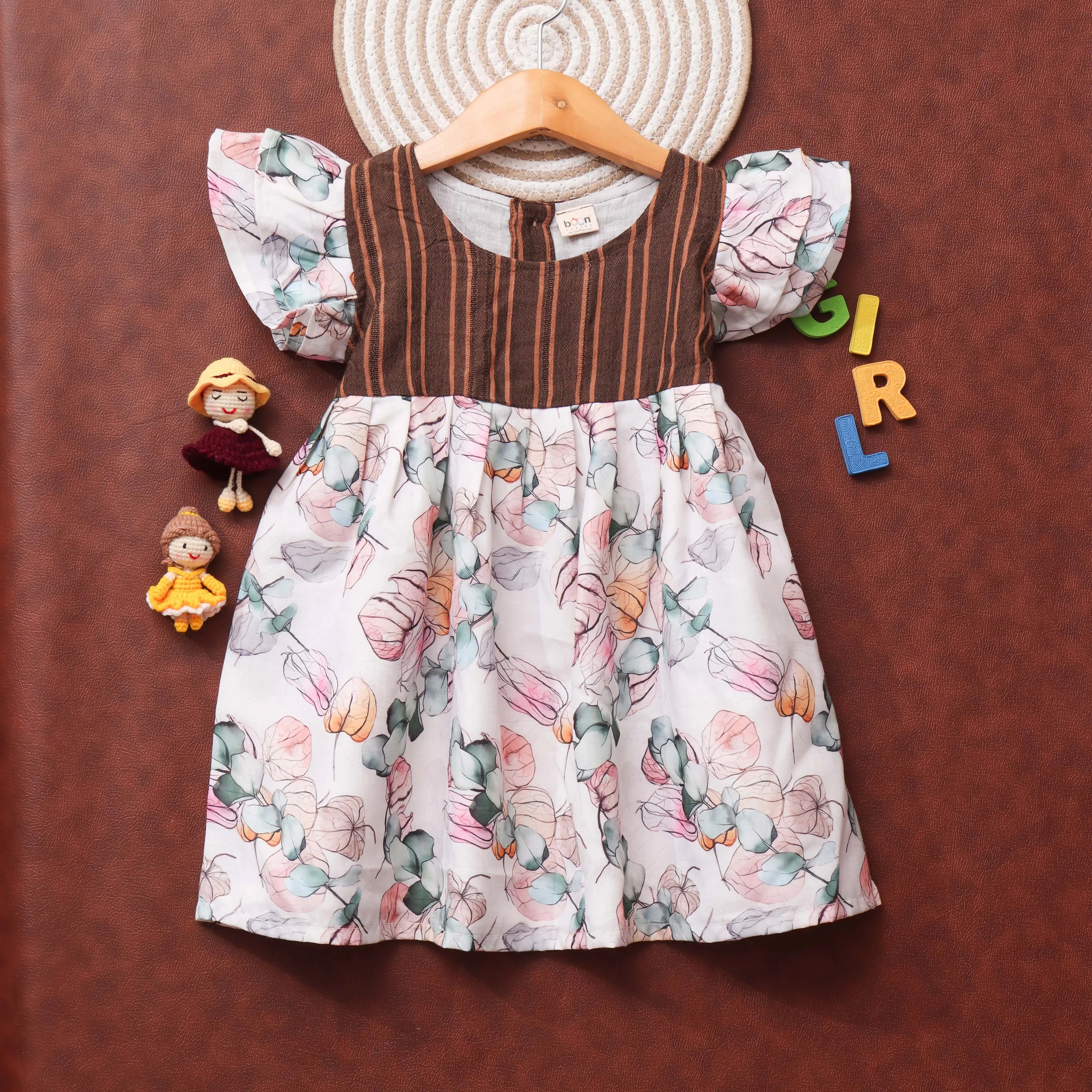 Fresh Foliage: Adorable Baby Girls Frock with Leaf Design